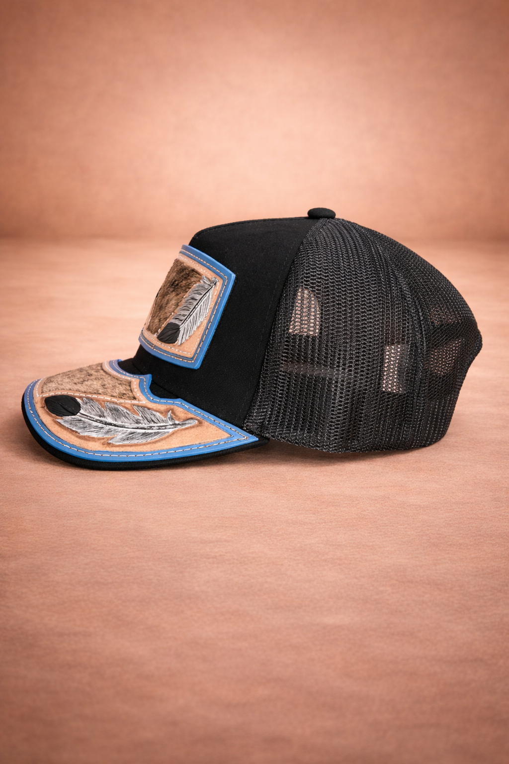 Cuero Santo Pluma Santa Cap