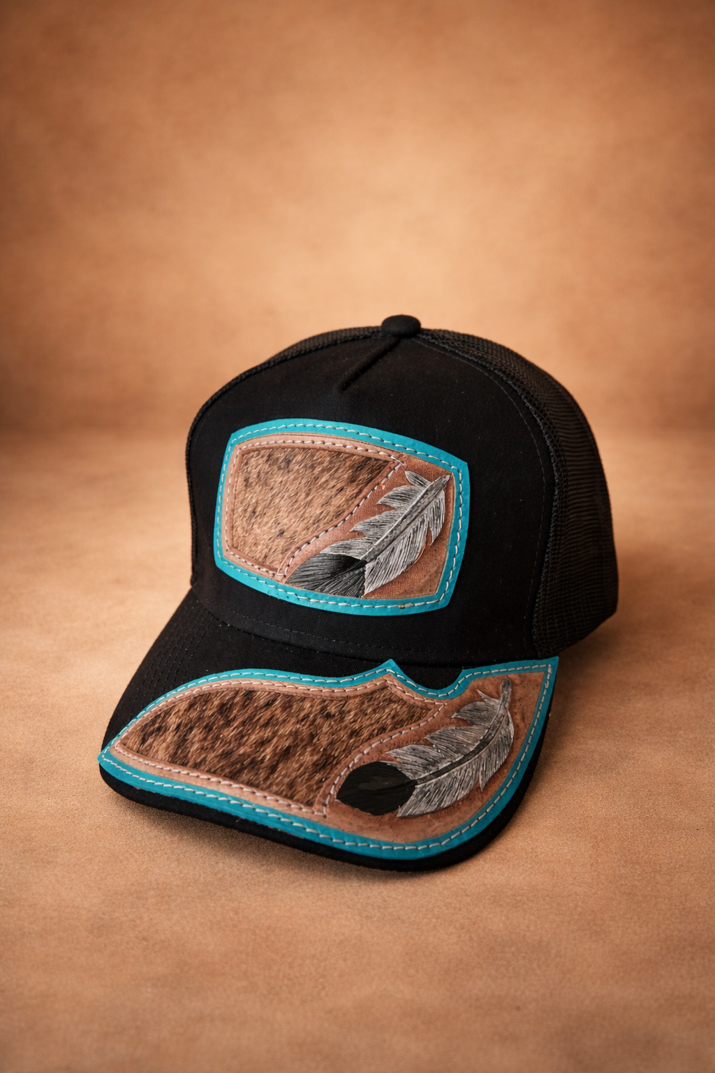 Cuero Santo Pluma Santa Cap