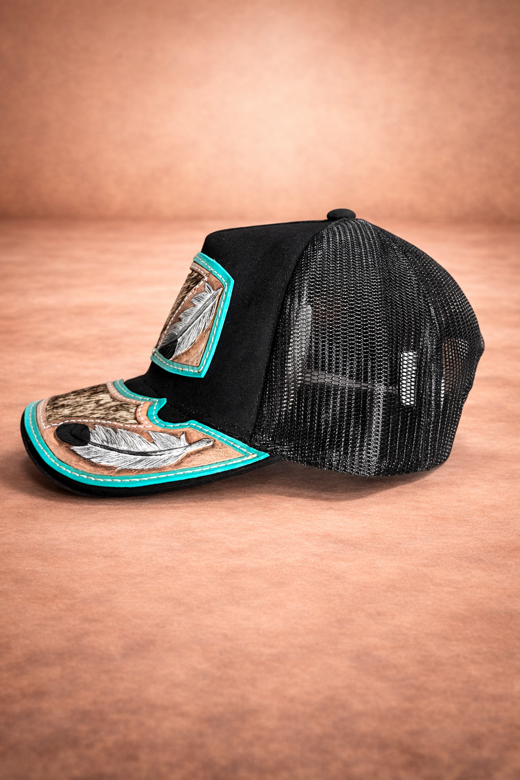 Cuero Santo Pluma Santa Cap